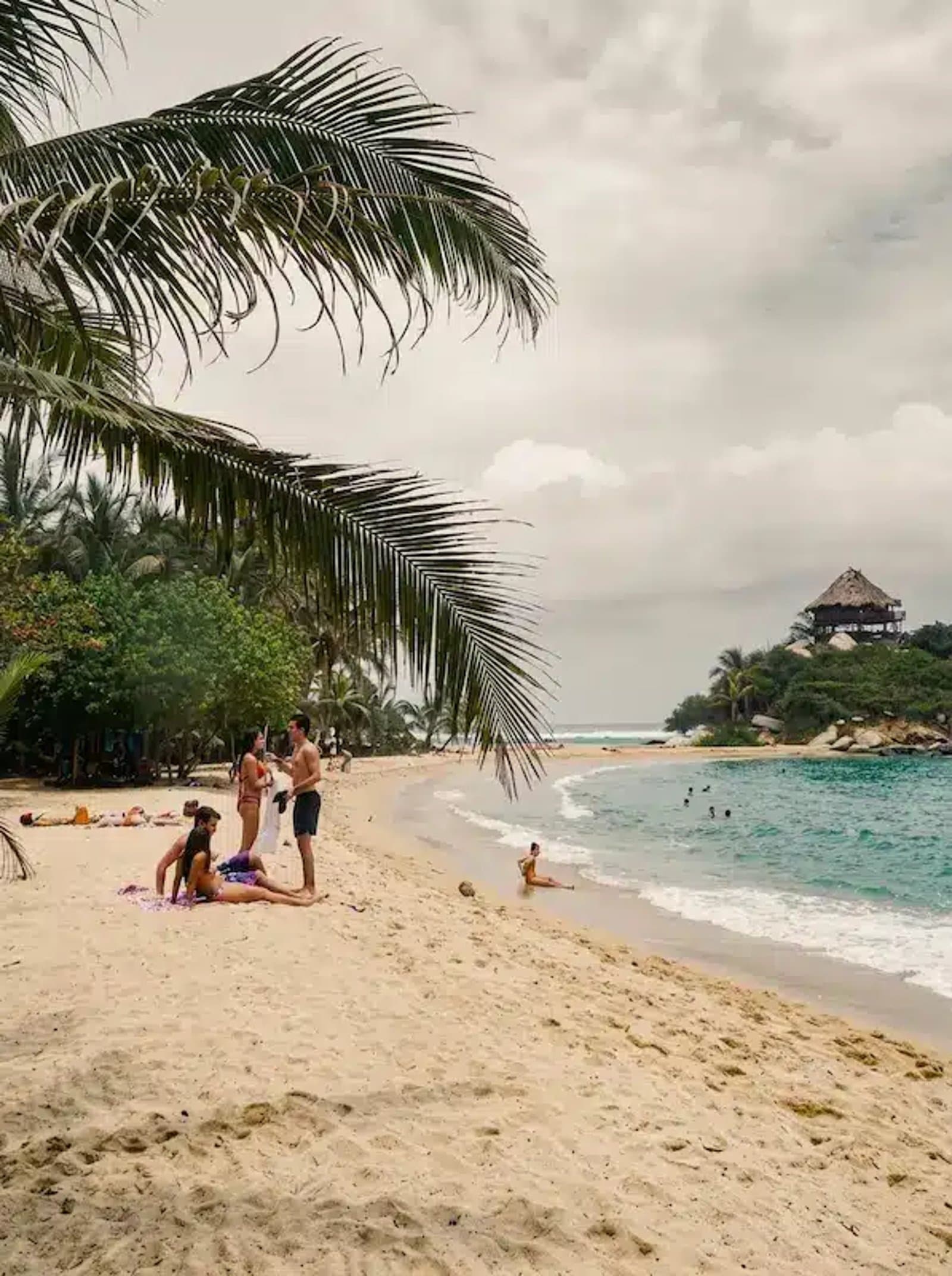 Turquoise water and jungle-fringed beach at Tayrona National Park, Colombia